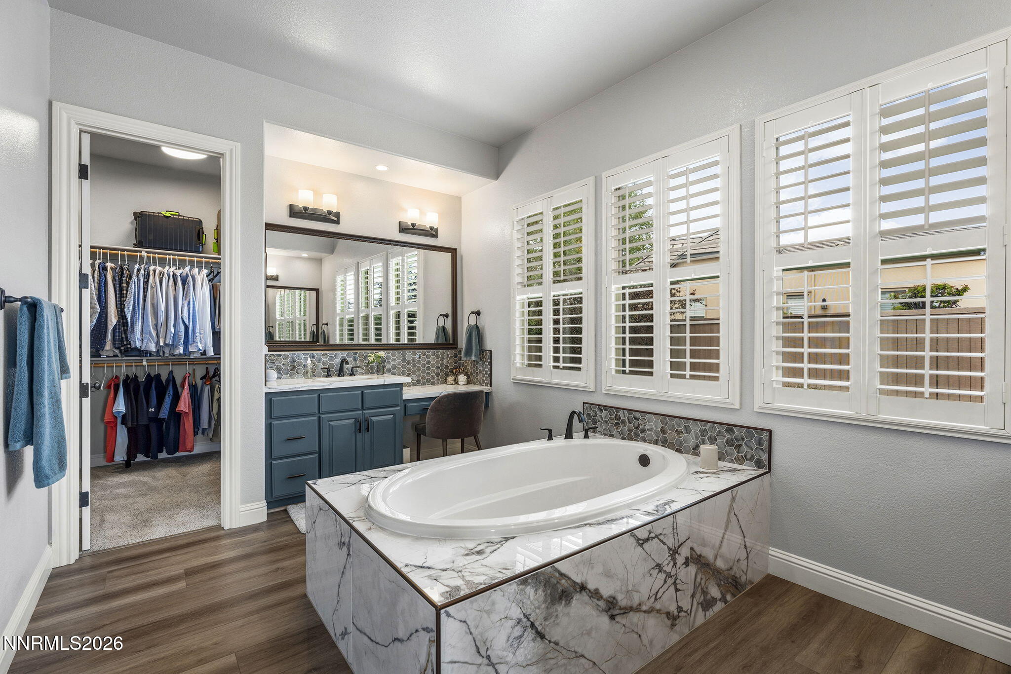 13340 Damonte View Lane Reno, NV 89511 - Photo 20 of 44 a spacious bathroom with a granite countertop tub and a sink
