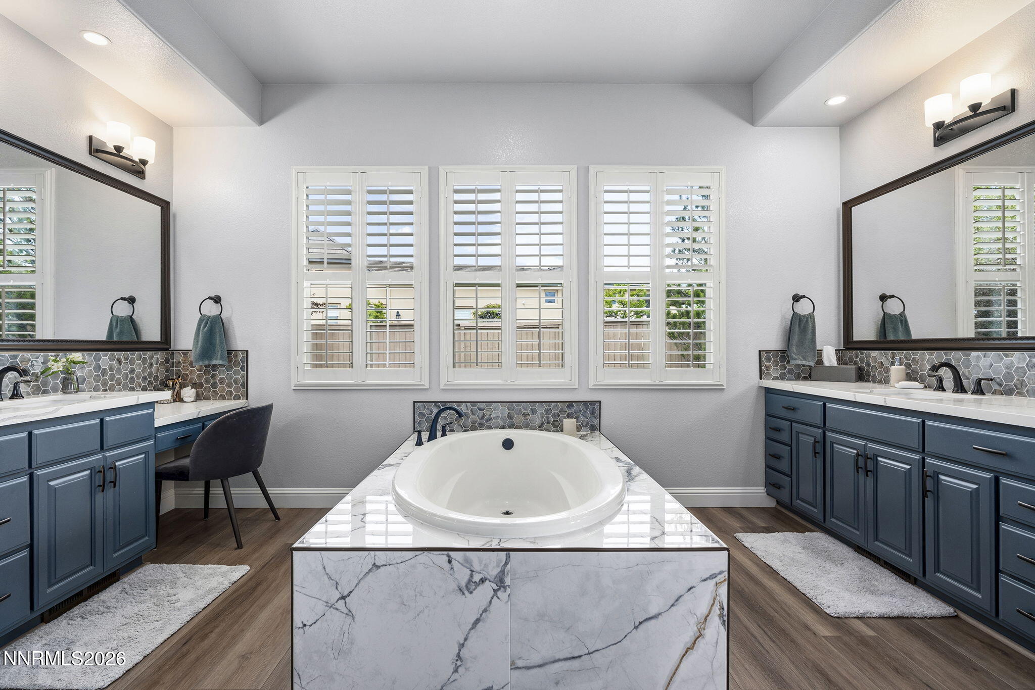 13340 Damonte View Lane Reno, NV 89511 - Photo 21 of 44 a spacious bathroom with a granite countertop tub sink and mirror