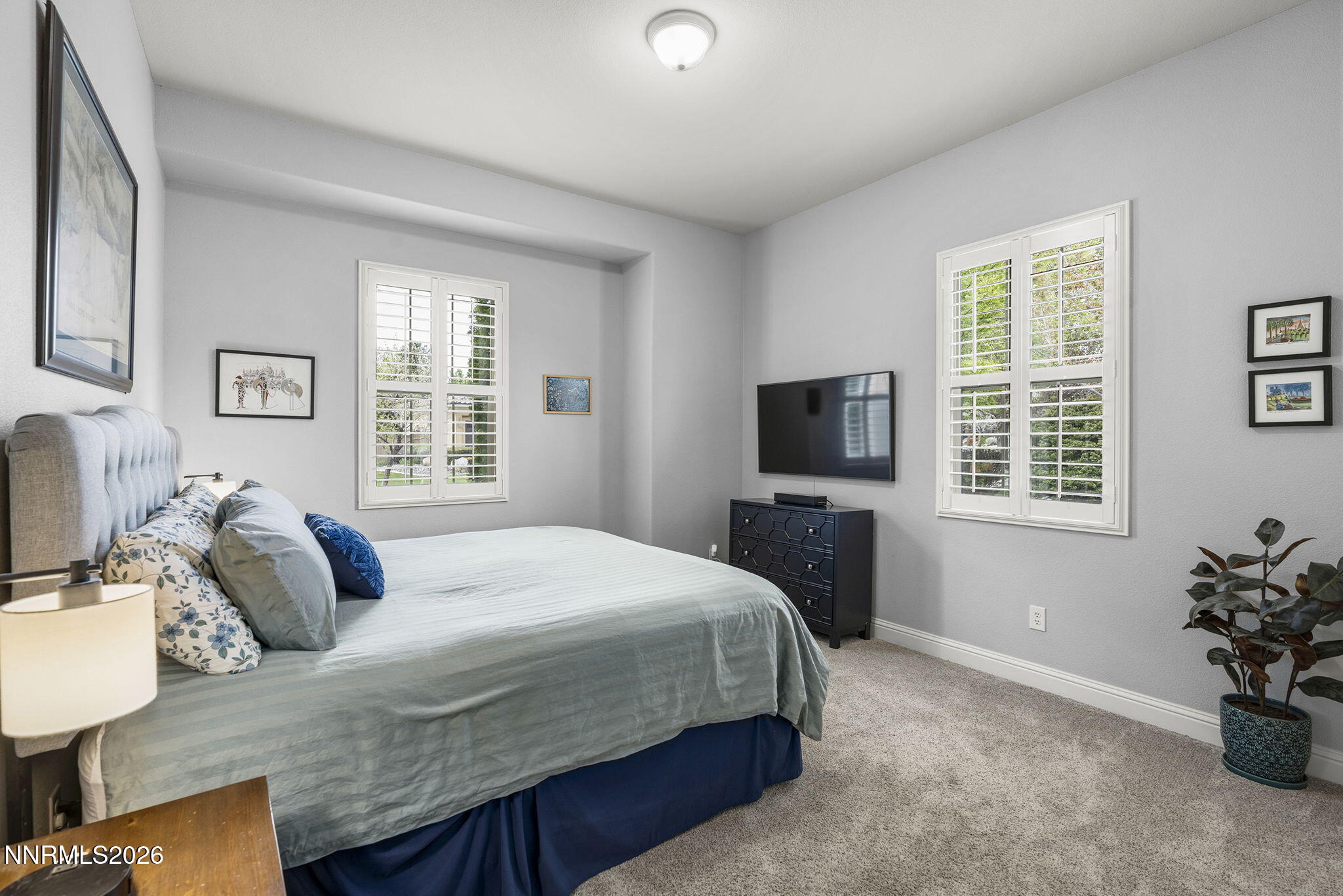 13340 Damonte View Lane Reno, NV 89511 - Photo 25 of 44 a bedroom with a bed and a television