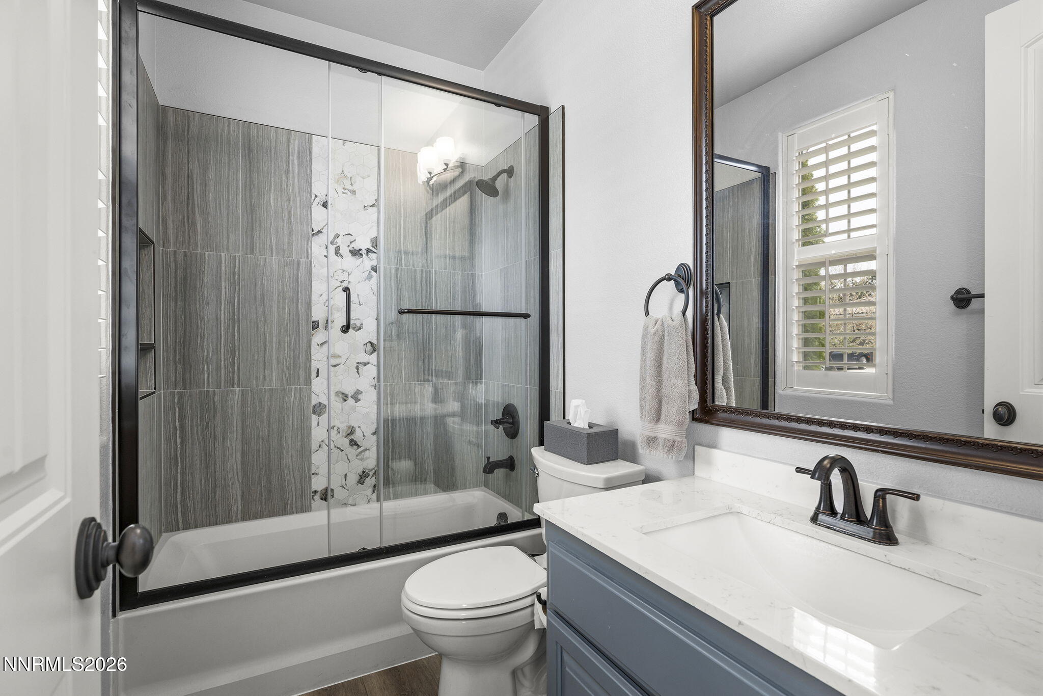 13340 Damonte View Lane Reno, NV 89511 - Photo 29 of 44 a bathroom with a granite countertop sink toilet and shower