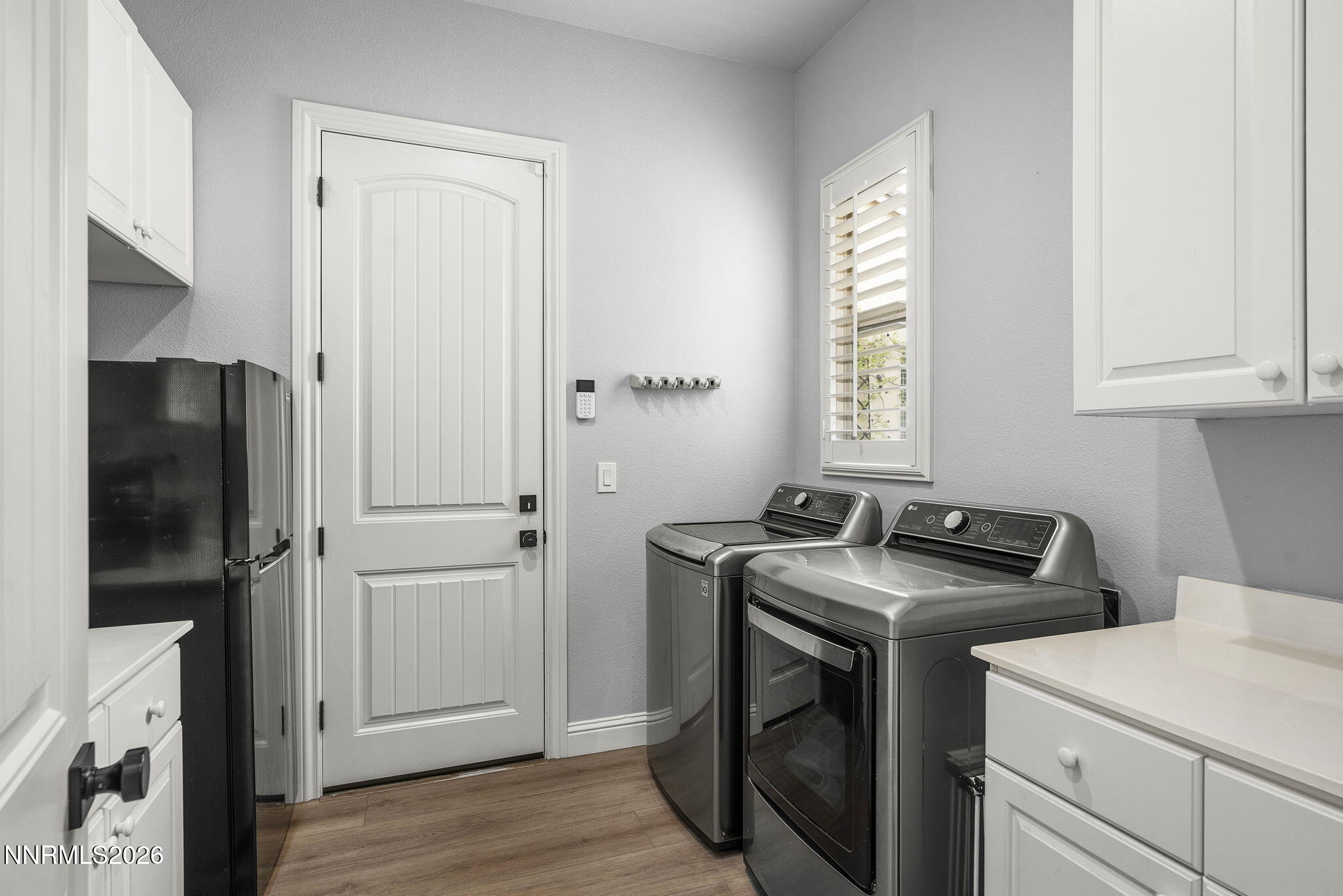 13340 Damonte View Lane Reno, NV 89511 - Photo 30 of 44 a utility room with closet dryer and washer