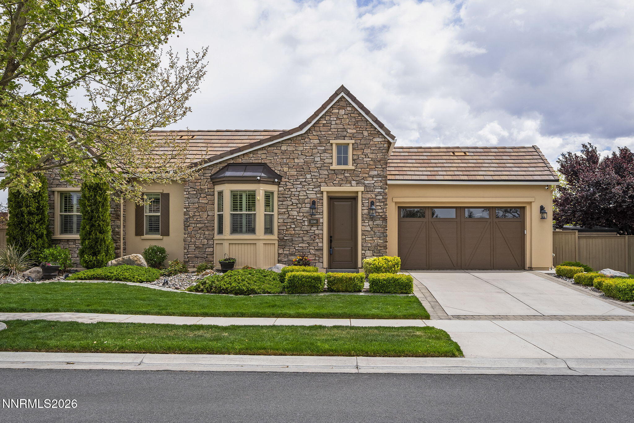 13340 Damonte View Lane Reno, NV 89511 - Photo 3 of 44 a front view of a house with a yard
