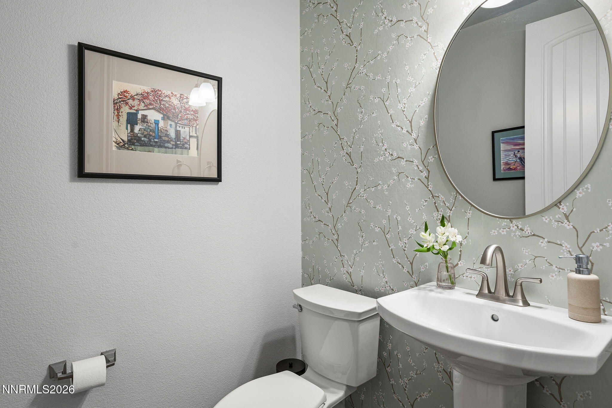 13340 Damonte View Lane Reno, NV 89511 - Photo 31 of 44 a bathroom with a toilet sink and mirror