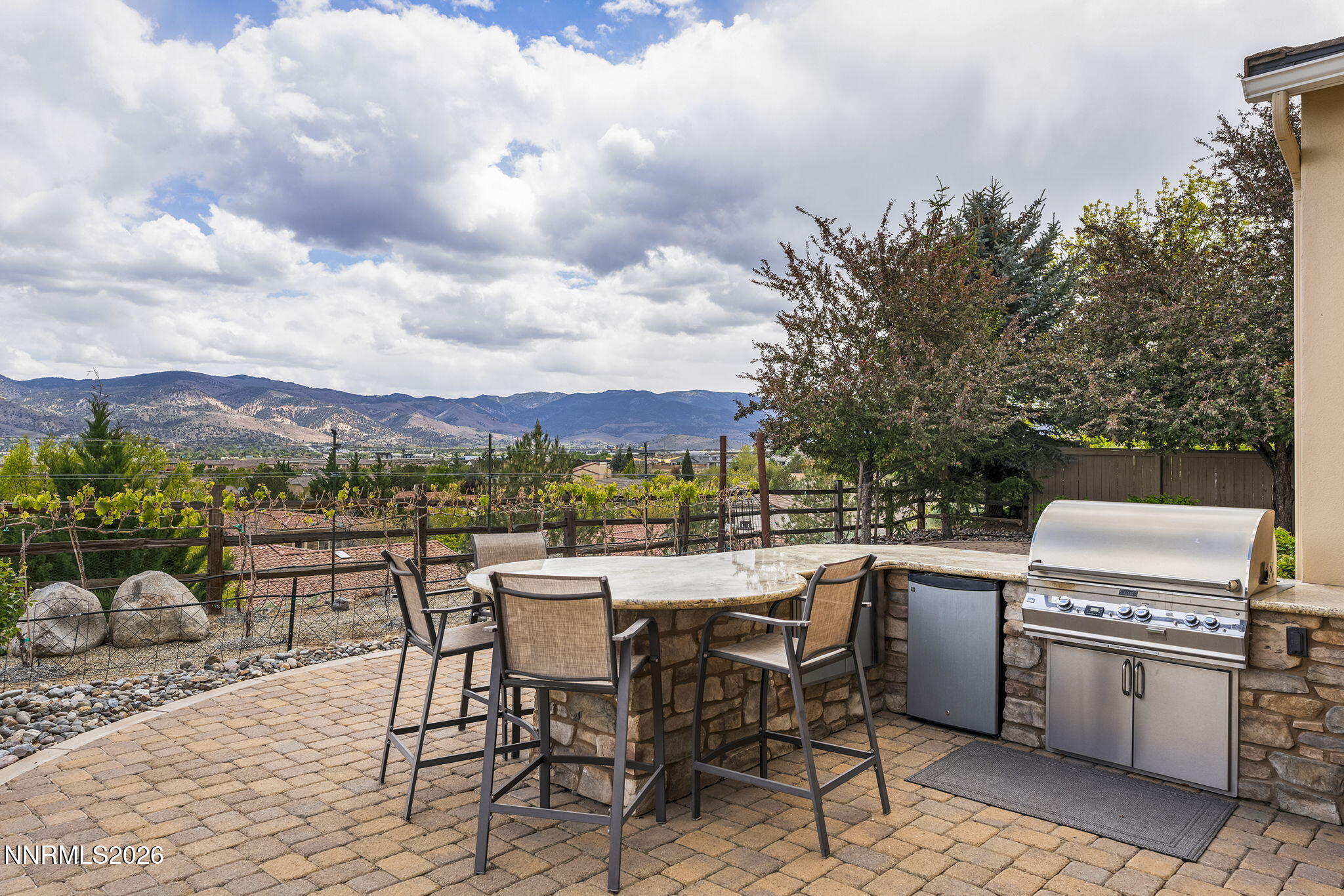 13340 Damonte View Lane Reno, NV 89511 - Photo 37 of 44 a view of a terrace with furniture and a stove