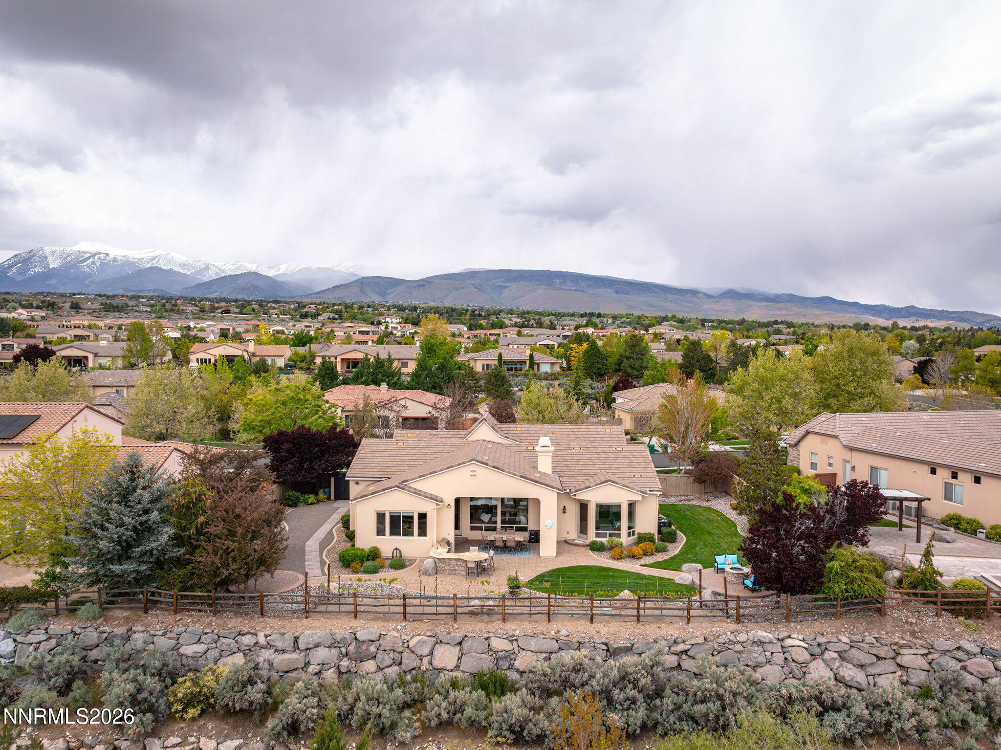 13340 Damonte View Lane Reno, NV 89511 - Photo 39 of 44 an aerial view of a house with a garden and lake view