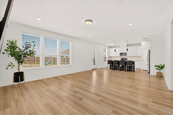 a view of a living room and dining room