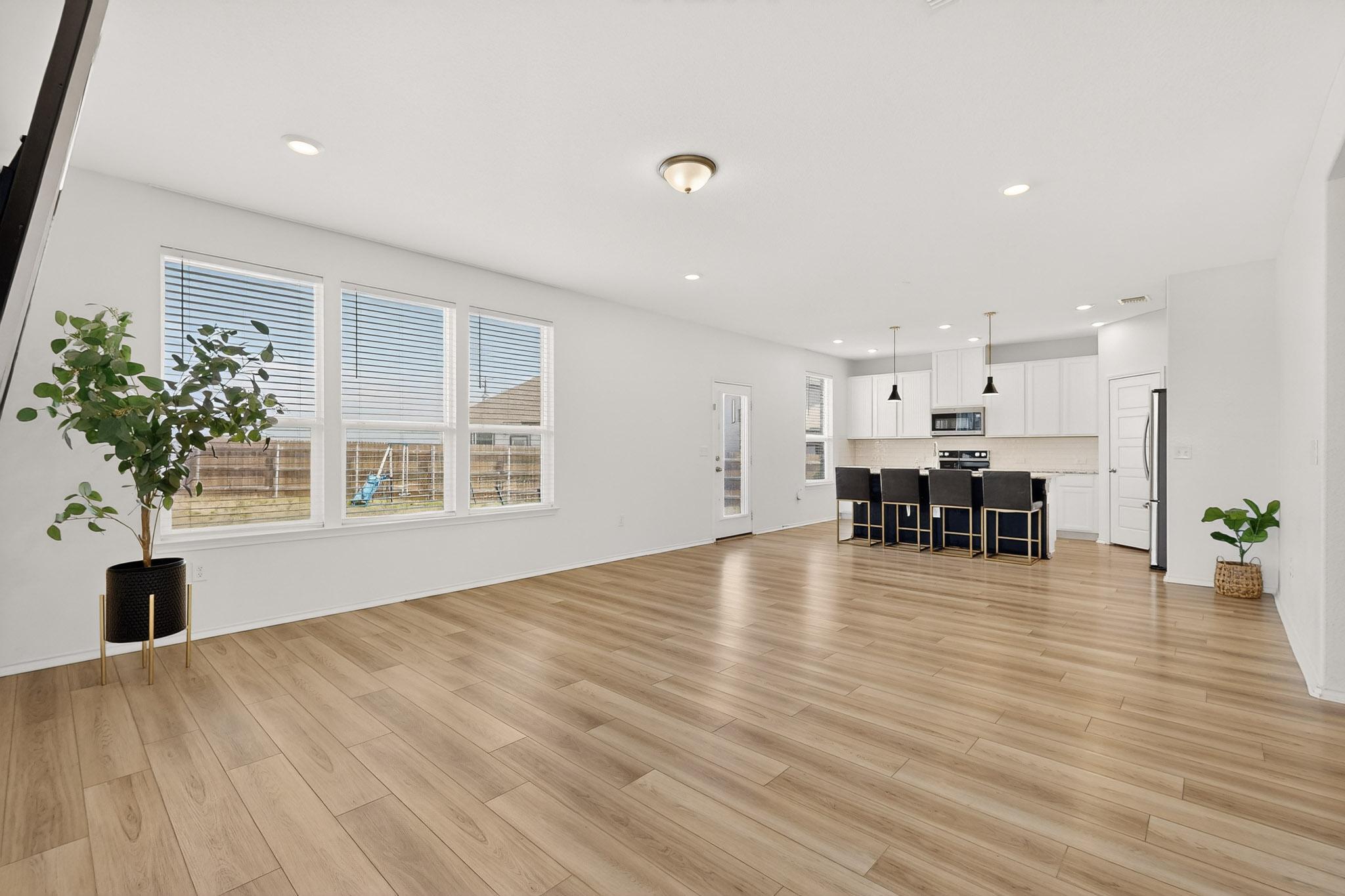 14513 Booted Eagle Pass Elgin, TX 78621 - Photo 13 of 34 a view of a living room and dining room