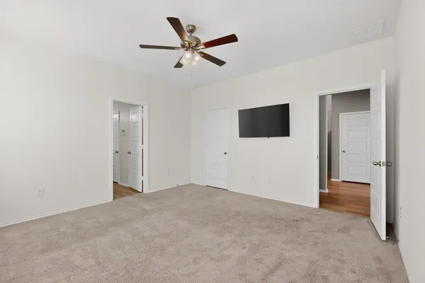 a view of a livingroom with a flat screen tv