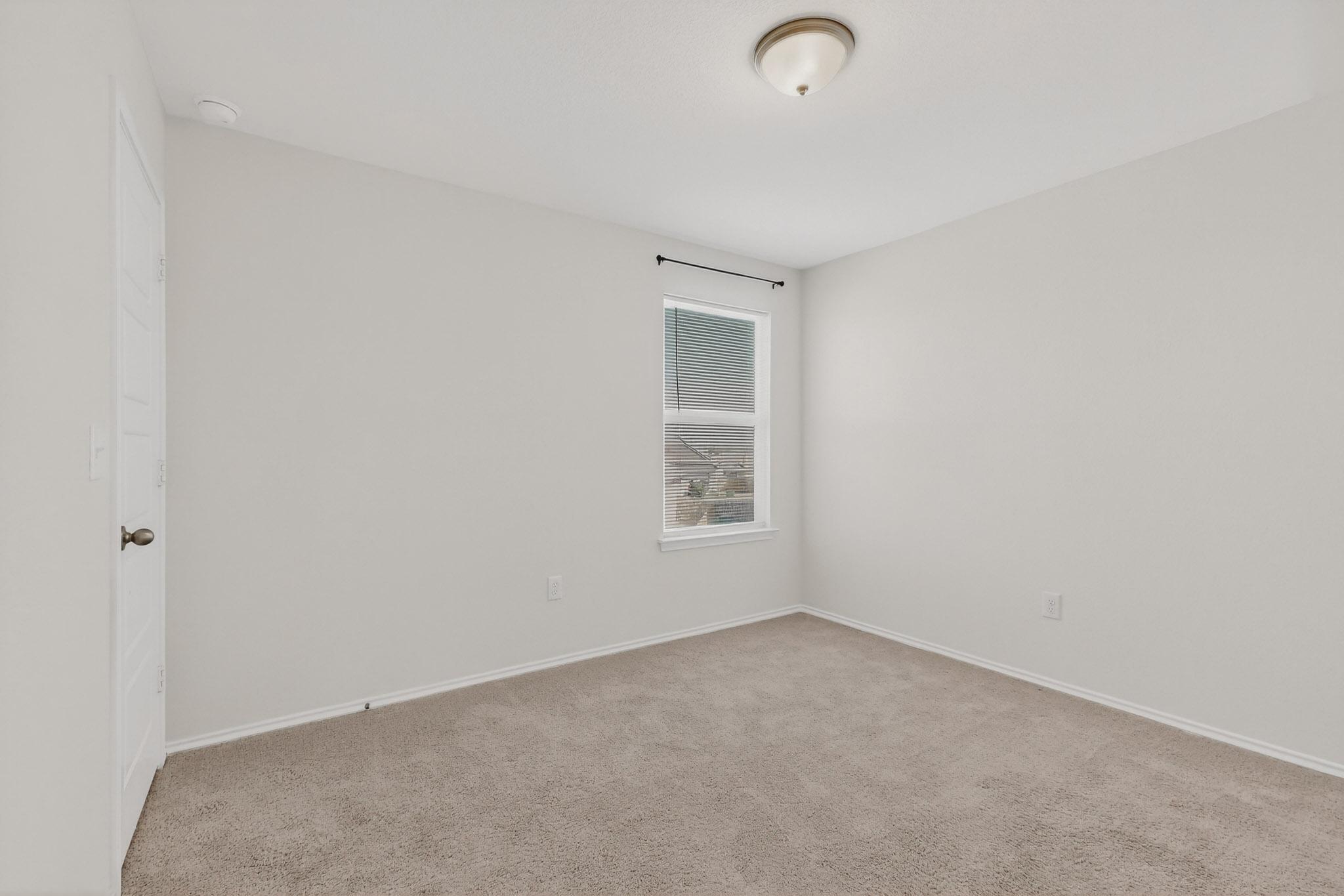 14513 Booted Eagle Pass Elgin, TX 78621 - Photo 23 of 34 a view of an empty room