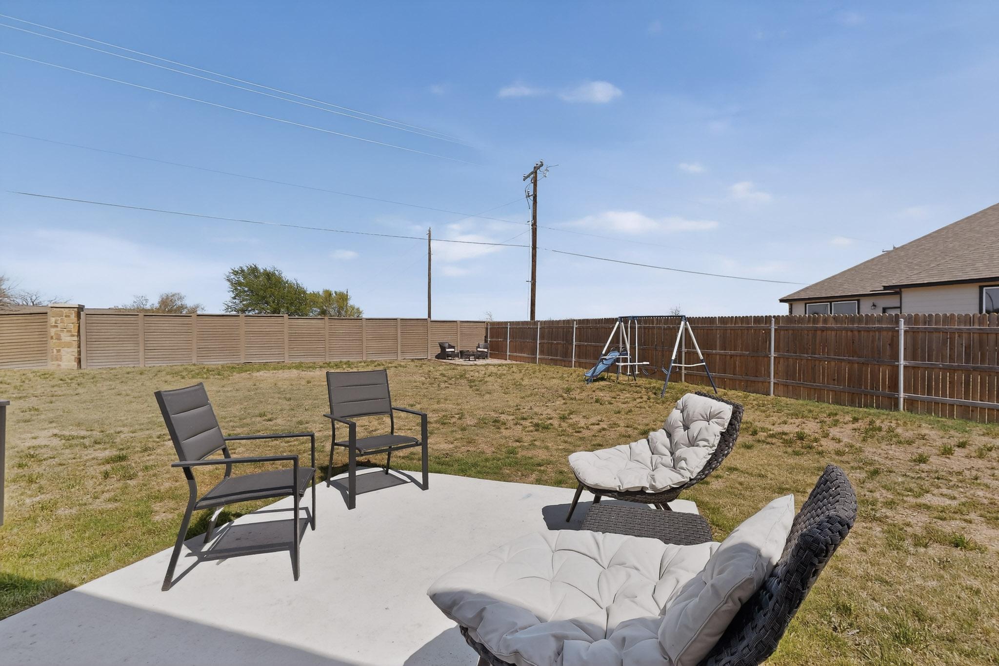 14513 Booted Eagle Pass Elgin, TX 78621 - Photo 29 of 34 a view of a terrace with seating area