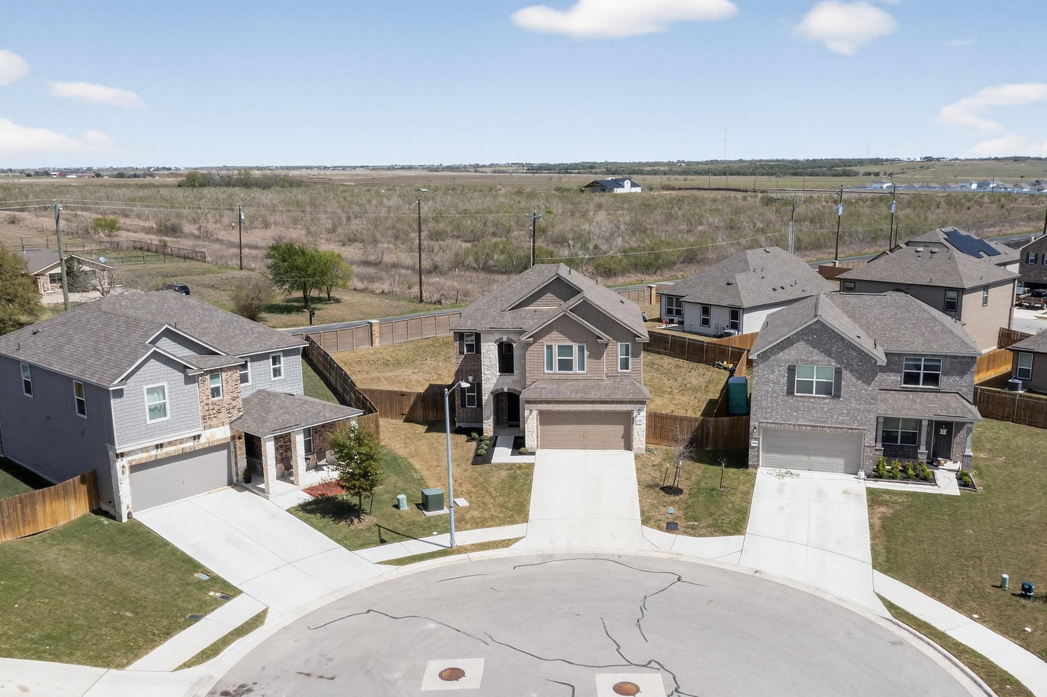 14513 Booted Eagle Pass Elgin, TX 78621 - Photo 33 of 34 an aerial view of a house with a garden