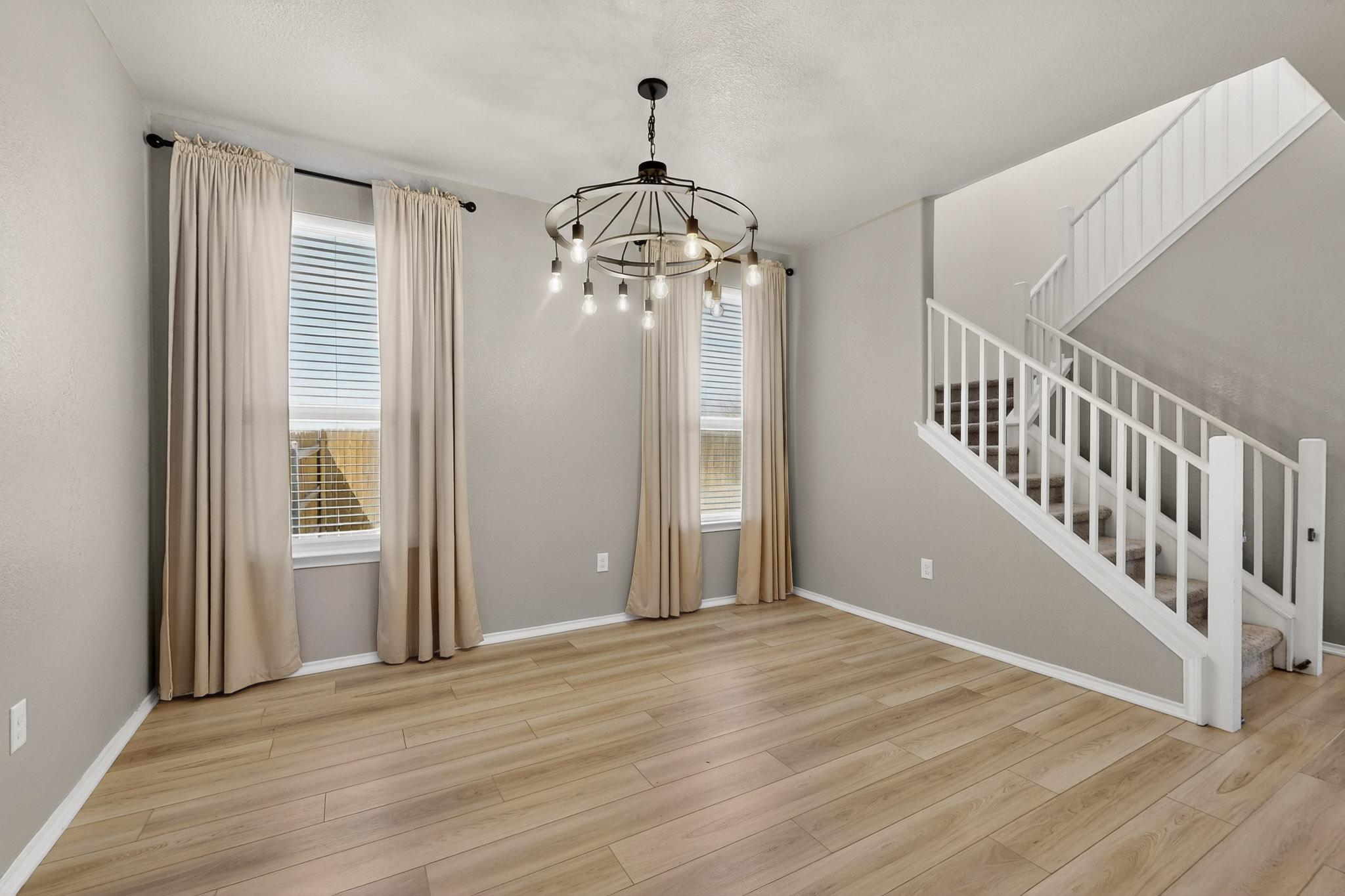 14513 Booted Eagle Pass Elgin, TX 78621 - Photo 8 of 34 a view of an entryway with wooden floor
