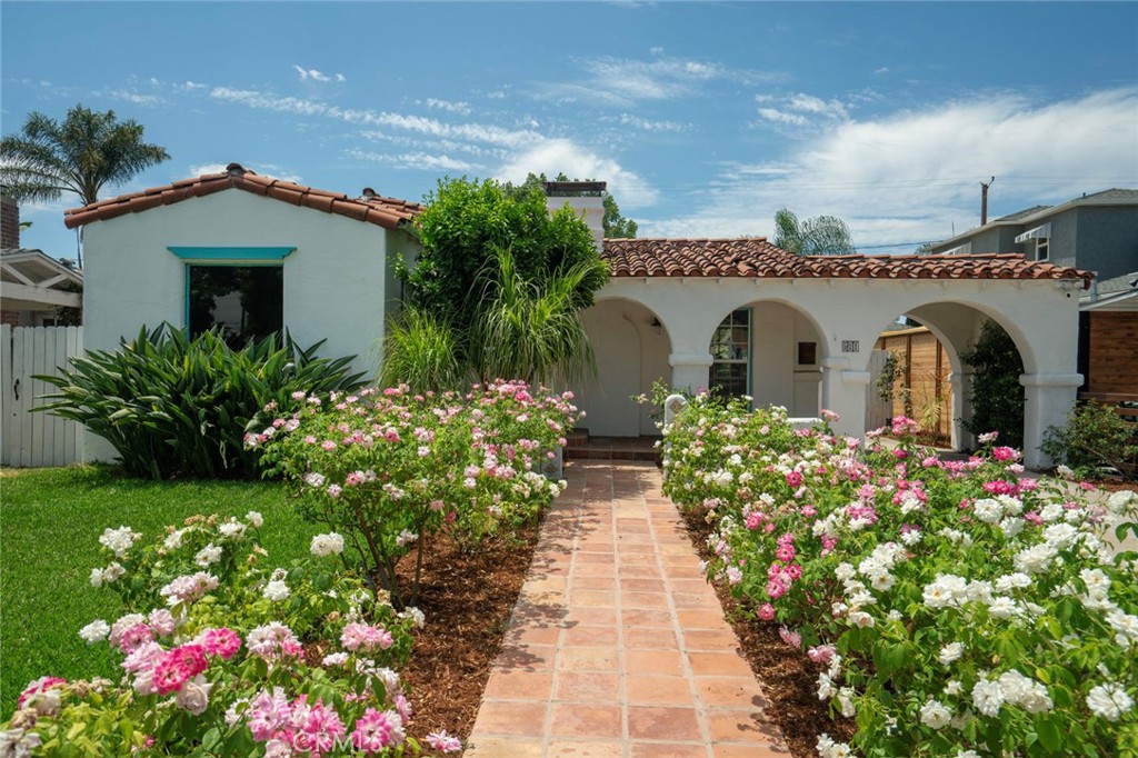 511 North Frederic Street Burbank, CA 91505 - Photo 1 of 1 a front view of a house with a garden