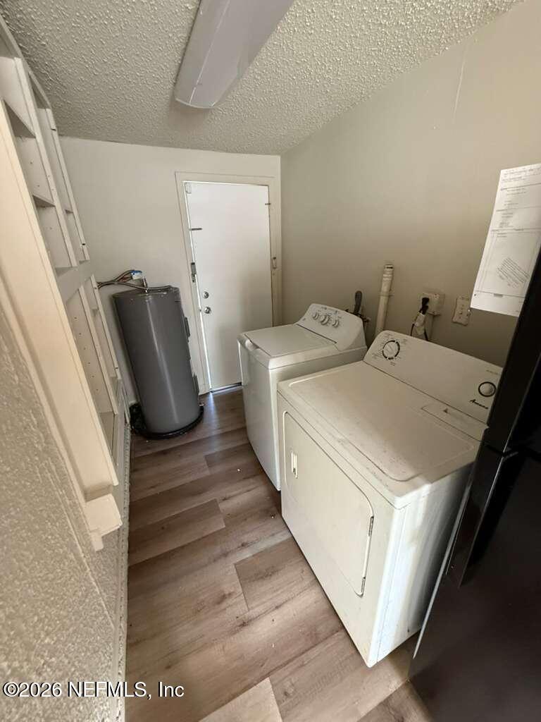 4067 Gilmore Street Jacksonville, FL 32205 - Photo 6 of 10 a utility room with dryer and washer