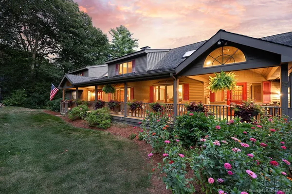 a backyard of a house with lots of green space
