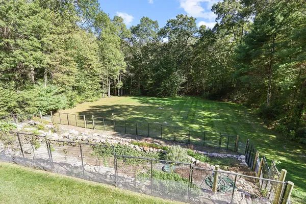 a view of a yard with an outdoor space