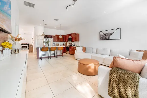 a living room with furniture and a couch