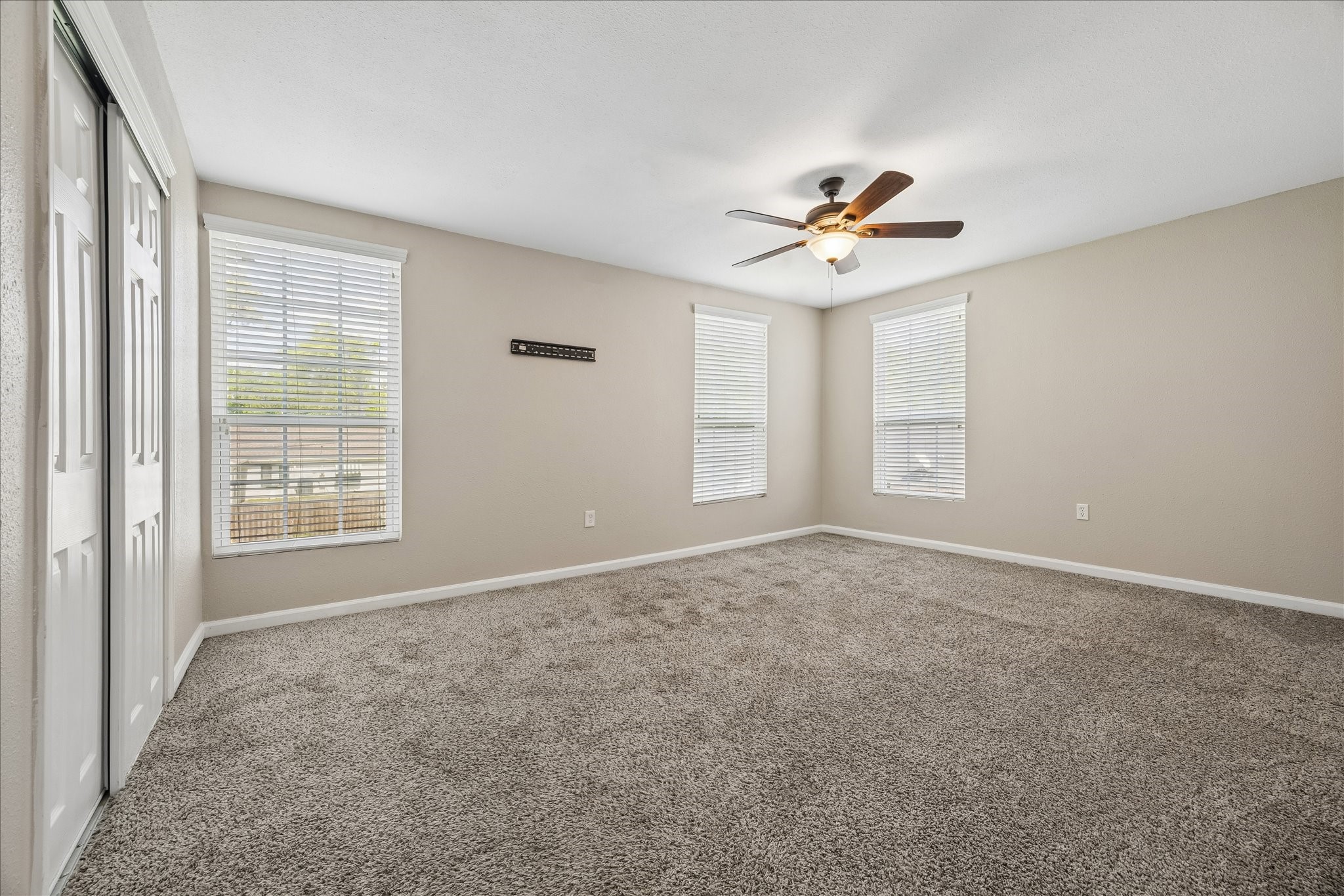 3817 Palm Street Houston, TX 77004 - Photo 14 of 15 wooden floor in an empty room with a window