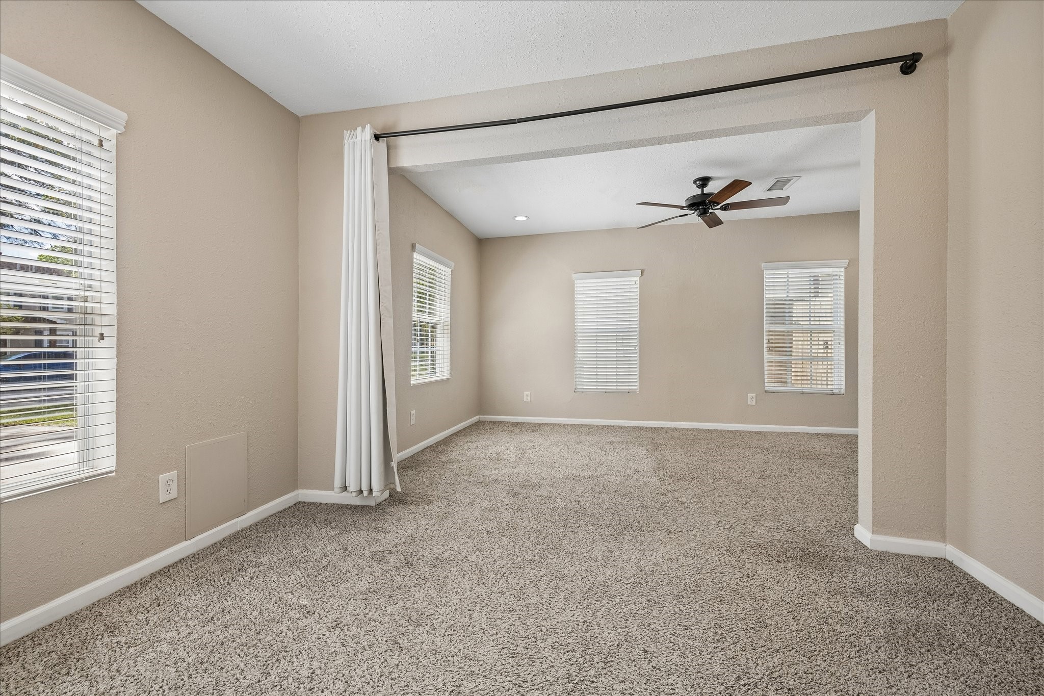3817 Palm Street Houston, TX 77004 - Photo 4 of 15 a view of an empty room with a window