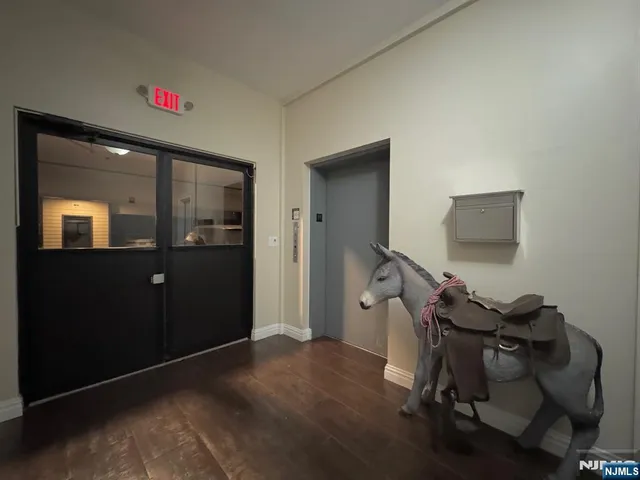 a room with furniture and wooden floor