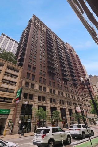 212 West Washington Street, Unit 908 Chicago, IL 60606 - Photo 1 of 32 a view of a tall building