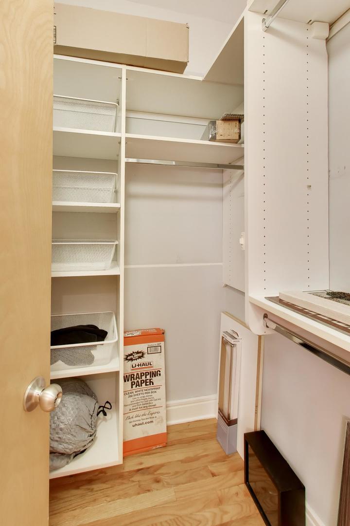 212 West Washington Street, Unit 908 Chicago, IL 60606 - Photo 17 of 32 a view of walk in closet with empty racks
