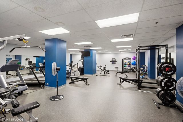 212 West Washington Street, Unit 908 Chicago, IL 60606 - Photo 25 of 32 a view of a room with gym equipment