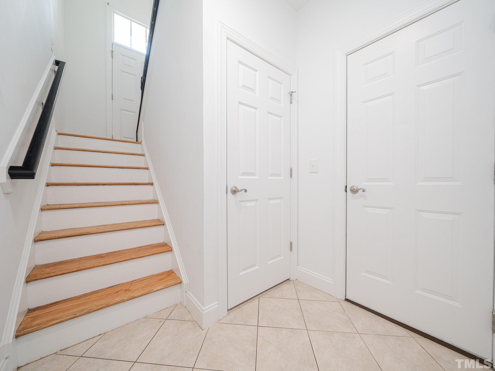 6109 Shandwick Court Raleigh, NC 27609 - Photo 20 of 36 a view of entryway with stairs