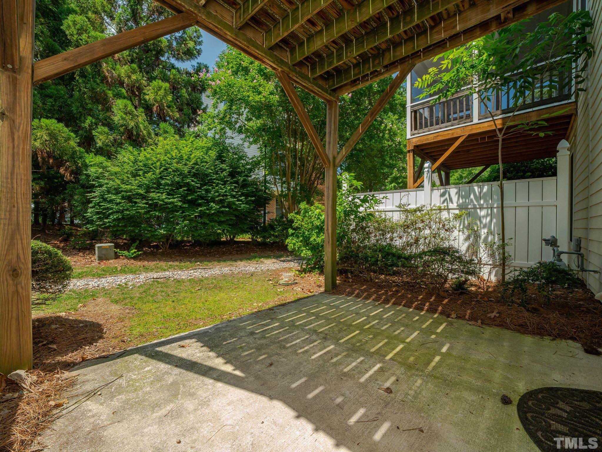 6109 Shandwick Court Raleigh, NC 27609 - Photo 34 of 36 a view of a backyard