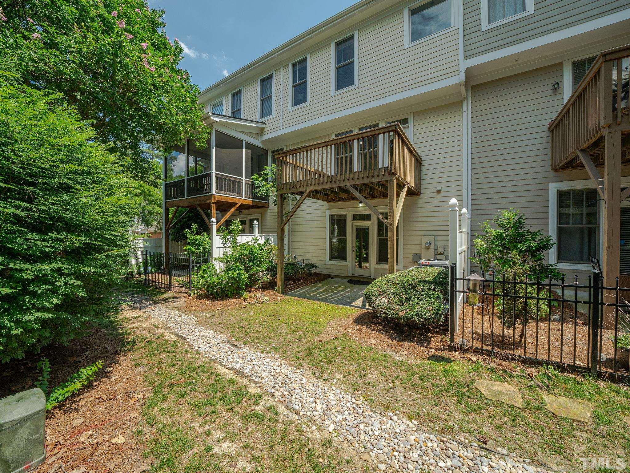 6109 Shandwick Court Raleigh, NC 27609 - Photo 35 of 36 a front view of a house with a yard