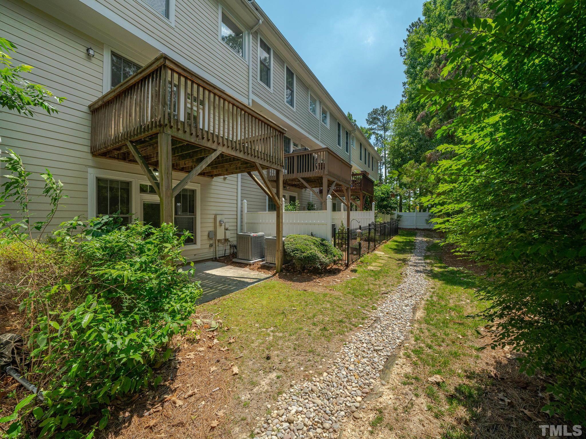 6109 Shandwick Court Raleigh, NC 27609 - Photo 36 of 36 a view of a house with a yard