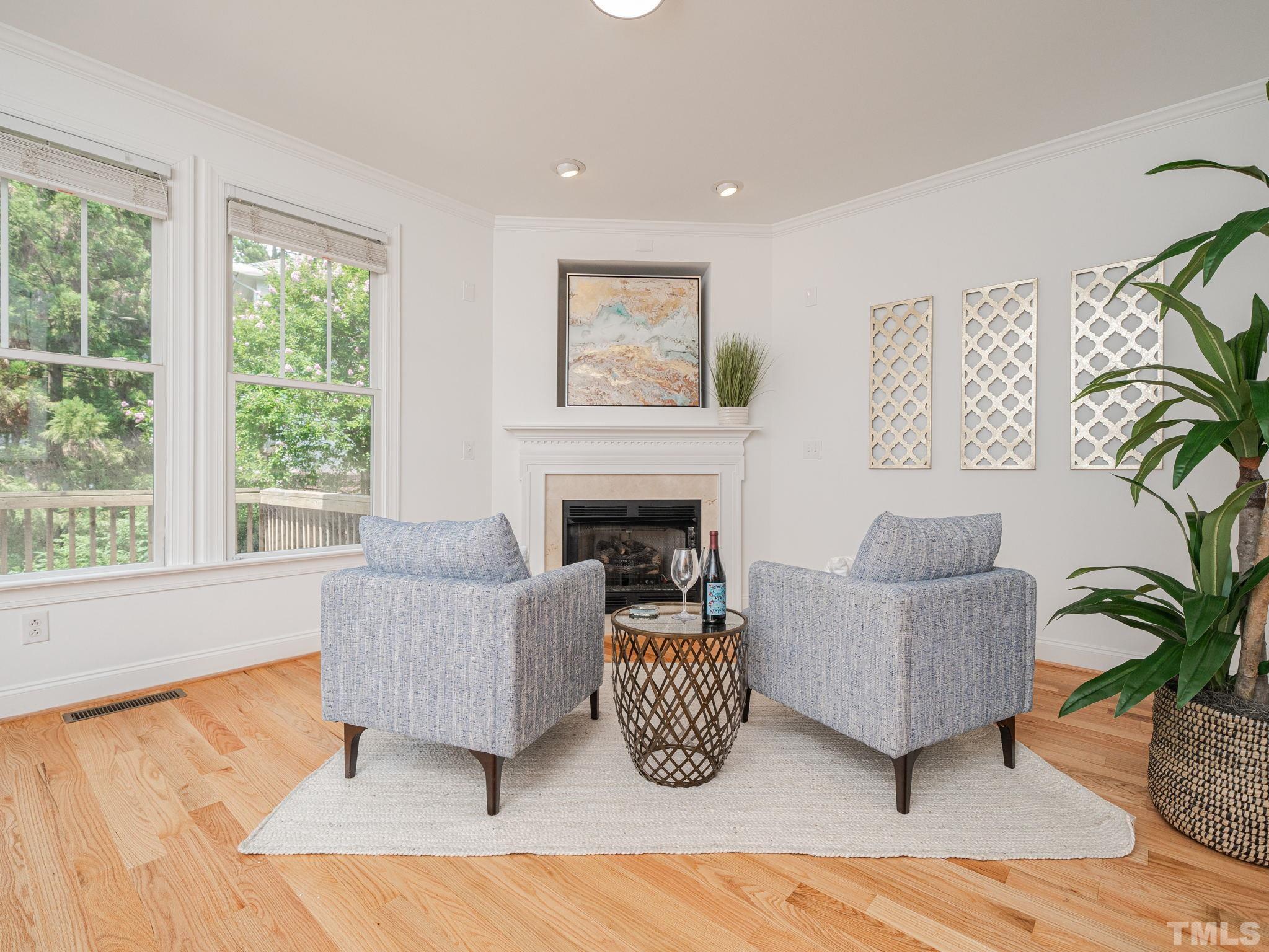 6109 Shandwick Court Raleigh, NC 27609 - Photo 8 of 36 a living room with furniture and a large window