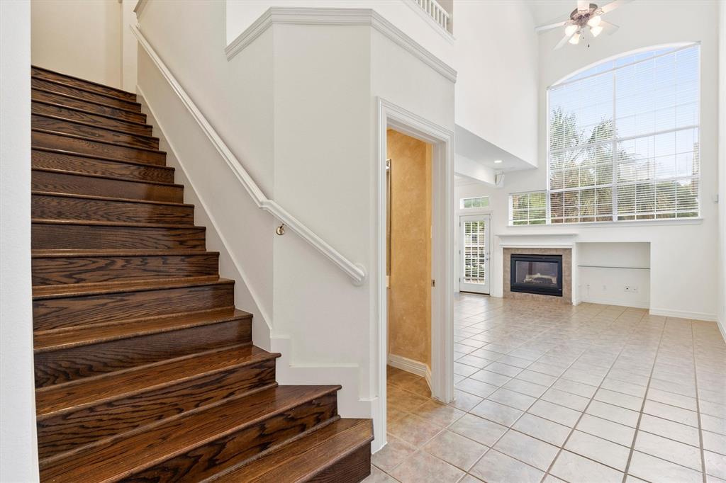 4106 Oberlin Way Addison, TX 75001 - Photo 2 of 17 a view of entryway and hall with wooden floor