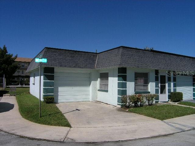 5225 Merit Drive New Port Richey, FL 34652 - Photo 1 of 1 Nice end unit 2/2/1 Villa.