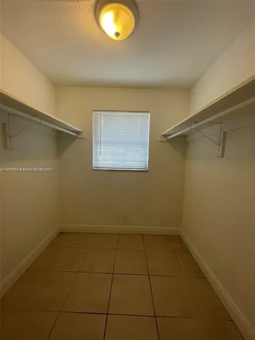 a view of a room with an empty space