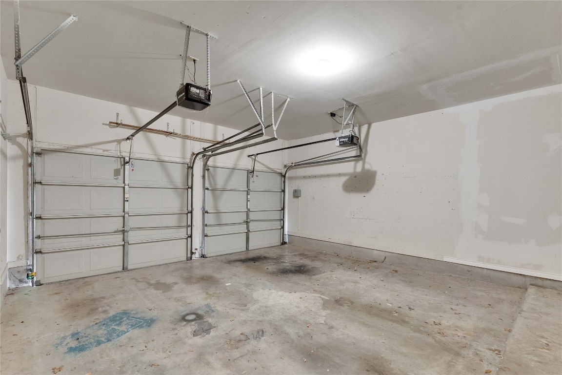 5407 Merrywing Circle Austin, TX 78730 - Photo 20 of 36 Garage with a garage door opener
