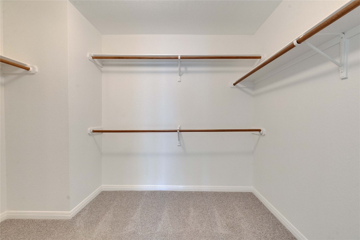 5407 Merrywing Circle Austin, TX 78730 - Photo 29 of 36 Walk in closet with light carpet