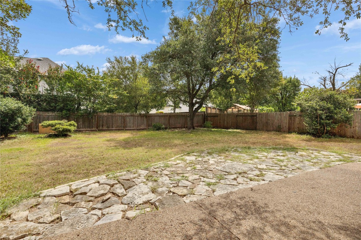 5407 Merrywing Circle Austin, TX 78730 - Photo 35 of 36 Fenced backyard featuring a patio