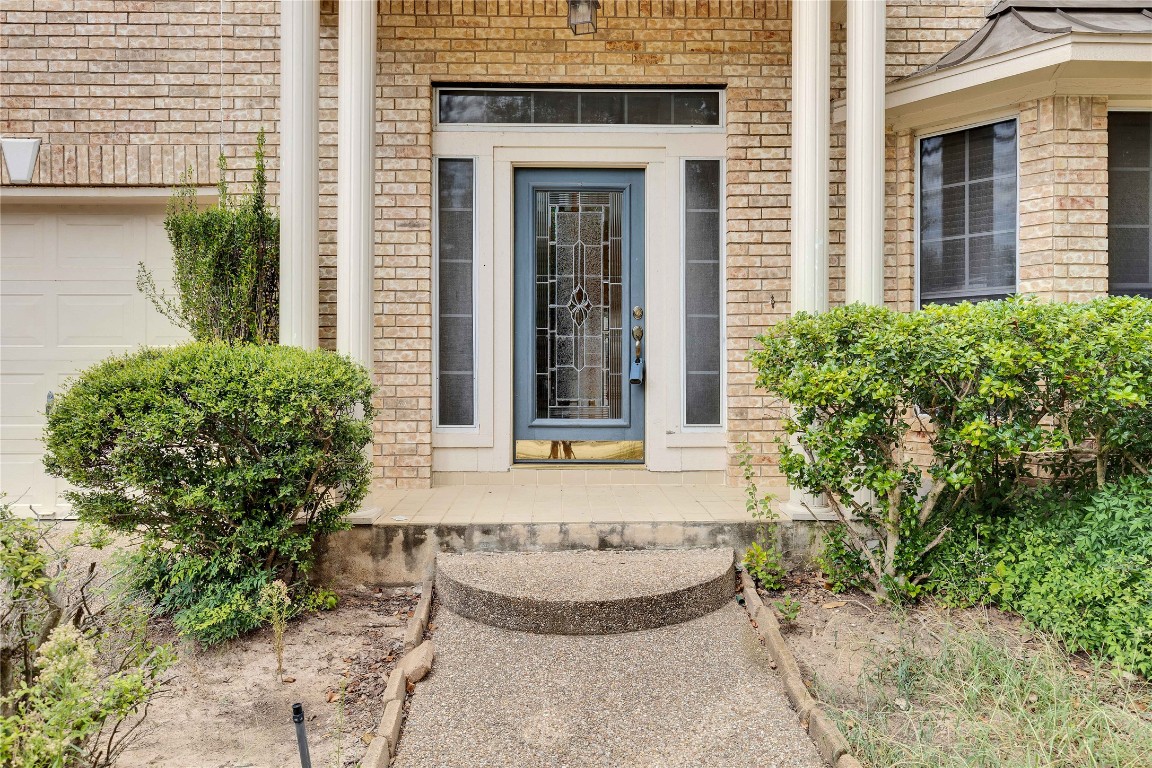 5407 Merrywing Circle Austin, TX 78730 - Photo 6 of 36 Property entrance featuring brick siding