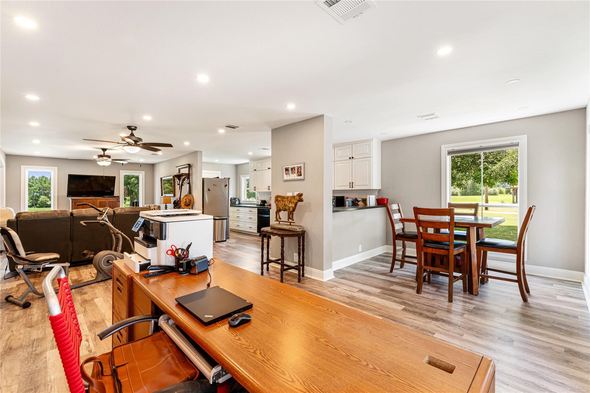 6063 Fm 1094 Sealy, TX 77474 - Photo 16 of 47 a view of a dining room with furniture and wooden floor