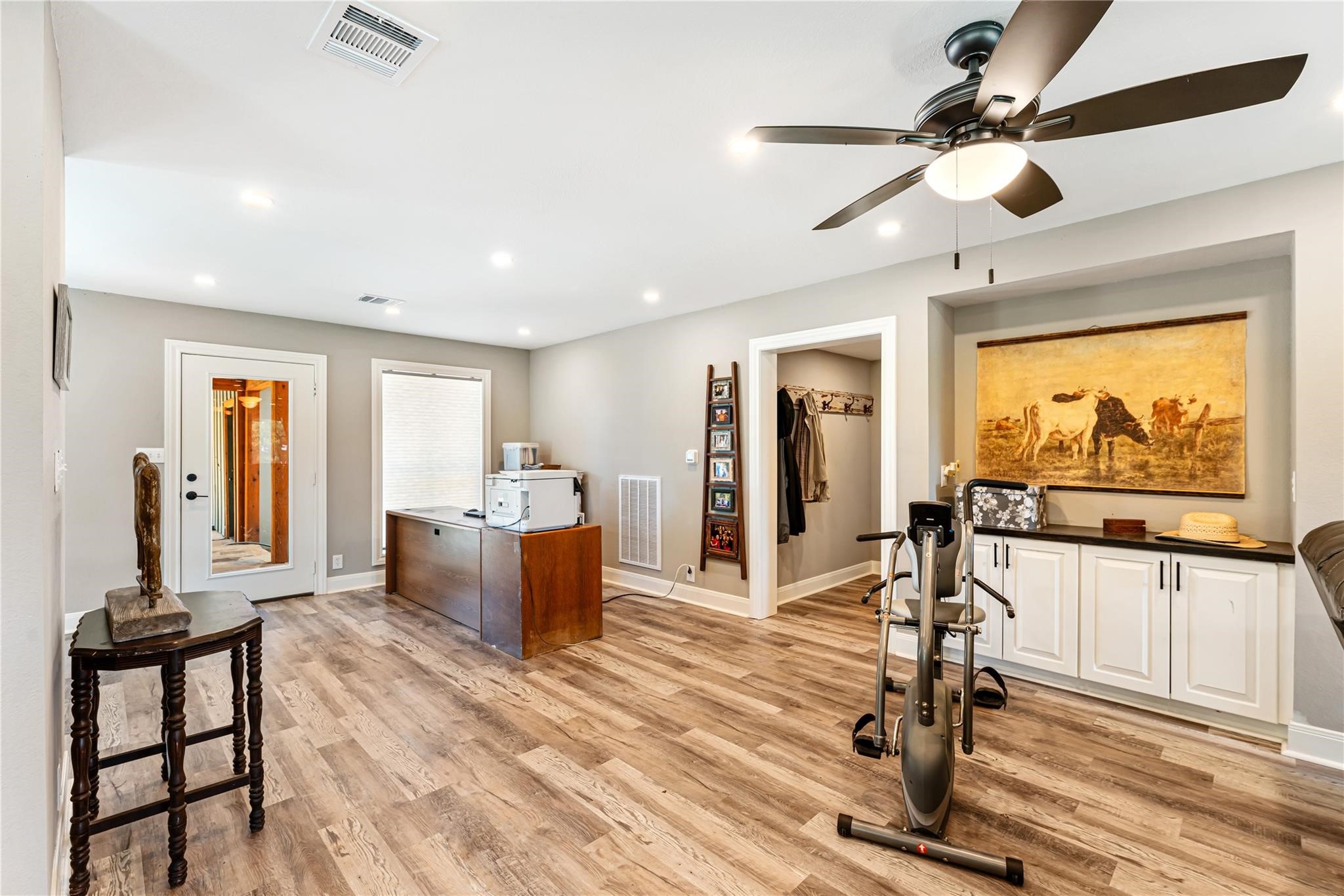 6063 Fm 1094 Sealy, TX 77474 - Photo 18 of 47 a living room with furniture a flat screen tv and a large window