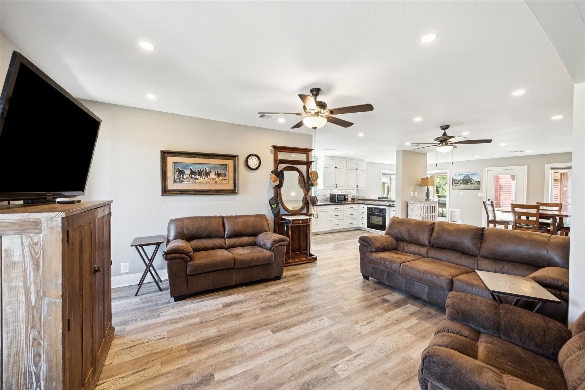 6063 Fm 1094 Sealy, TX 77474 - Photo 20 of 47 a living room with furniture and a flat screen tv