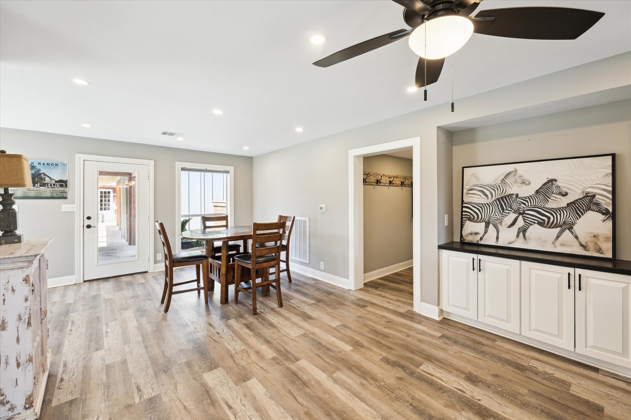 6063 Fm 1094 Sealy, TX 77474 - Photo 27 of 47 a view of a dining room with furniture window and wooden floor
