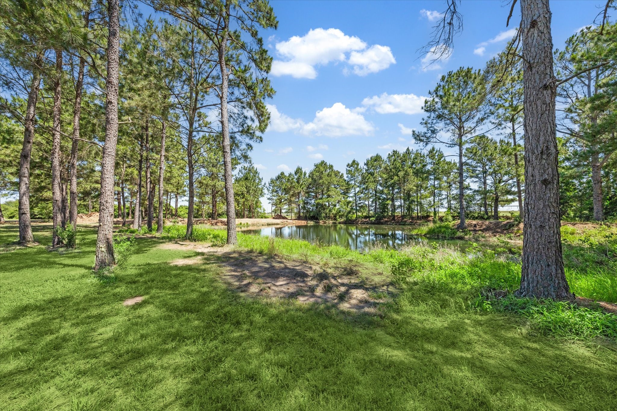 6063 Fm 1094 Sealy, TX 77474 - Photo 3 of 47 a view of lake with a building