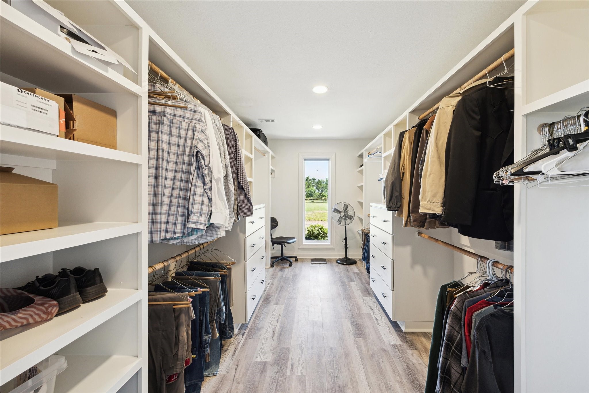 6063 Fm 1094 Sealy, TX 77474 - Photo 39 of 47 a view of walk in closet with clothes and shoes