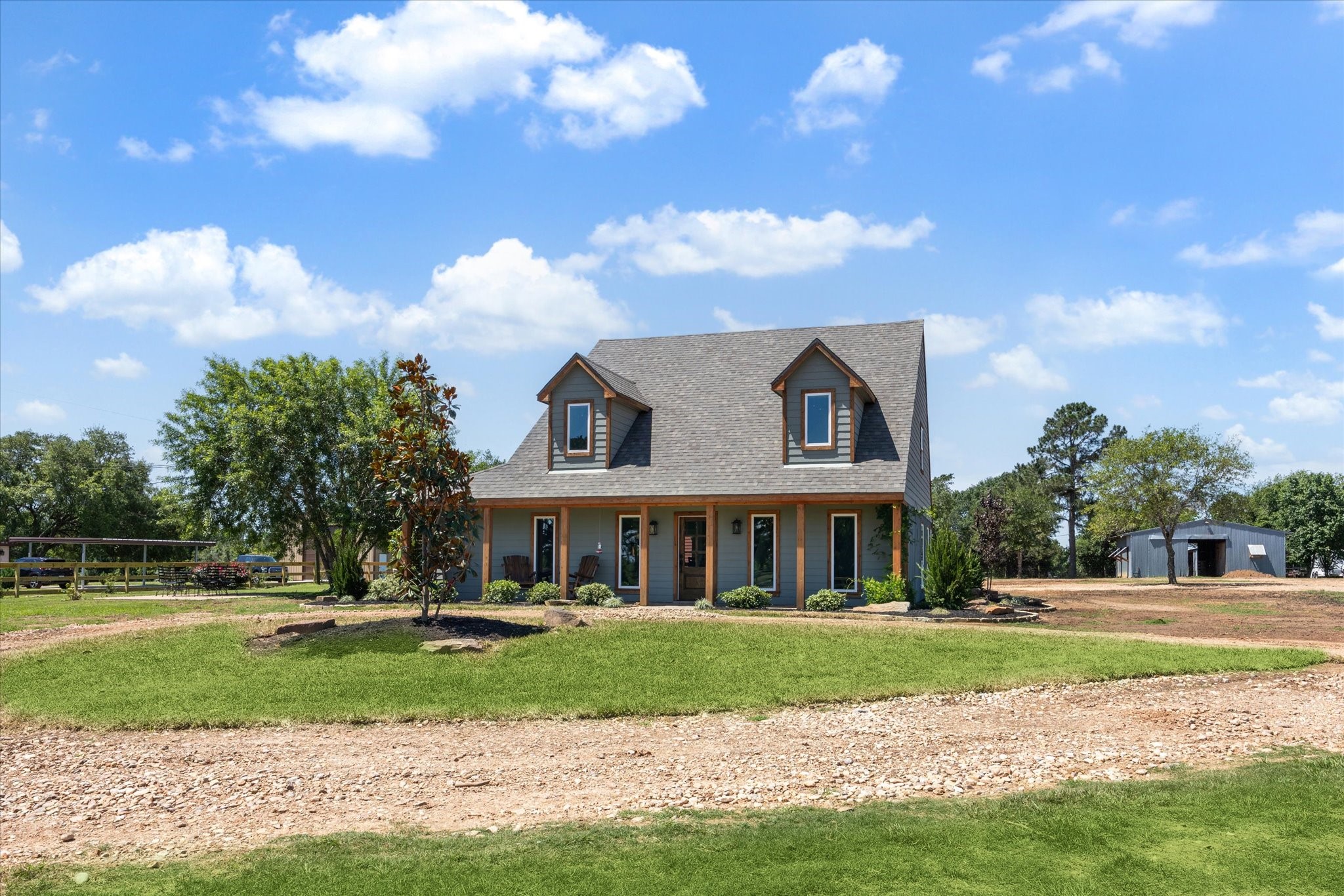 6063 Fm 1094 Sealy, TX 77474 - Photo 7 of 47 a front view of a house with a yard