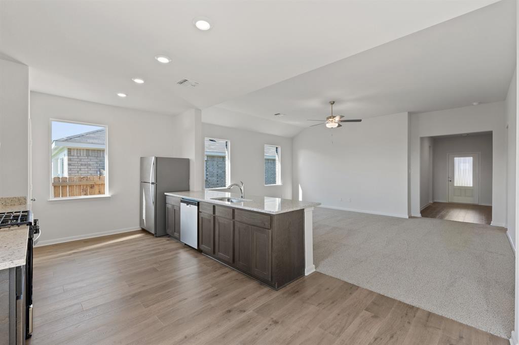 13413 Hang Fire Lane Cresson, TX 76035 - Photo 8 of 8 a view of a kitchen with cabinets and wooden floor