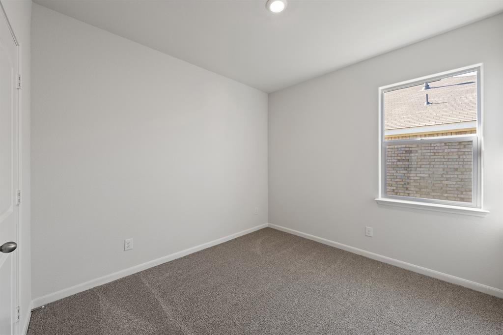 13413 Hang Fire Lane Cresson, TX 76035 - Photo 6 of 8 an empty room with a window