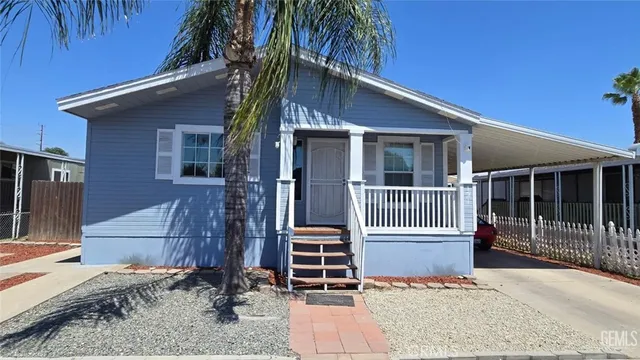 a front view of a house with a garage