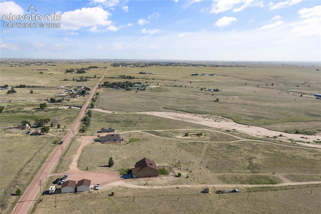 2105 Slocum Road Peyton, CO 80831 - Photo 31 of 31 a view of an ocean and beach